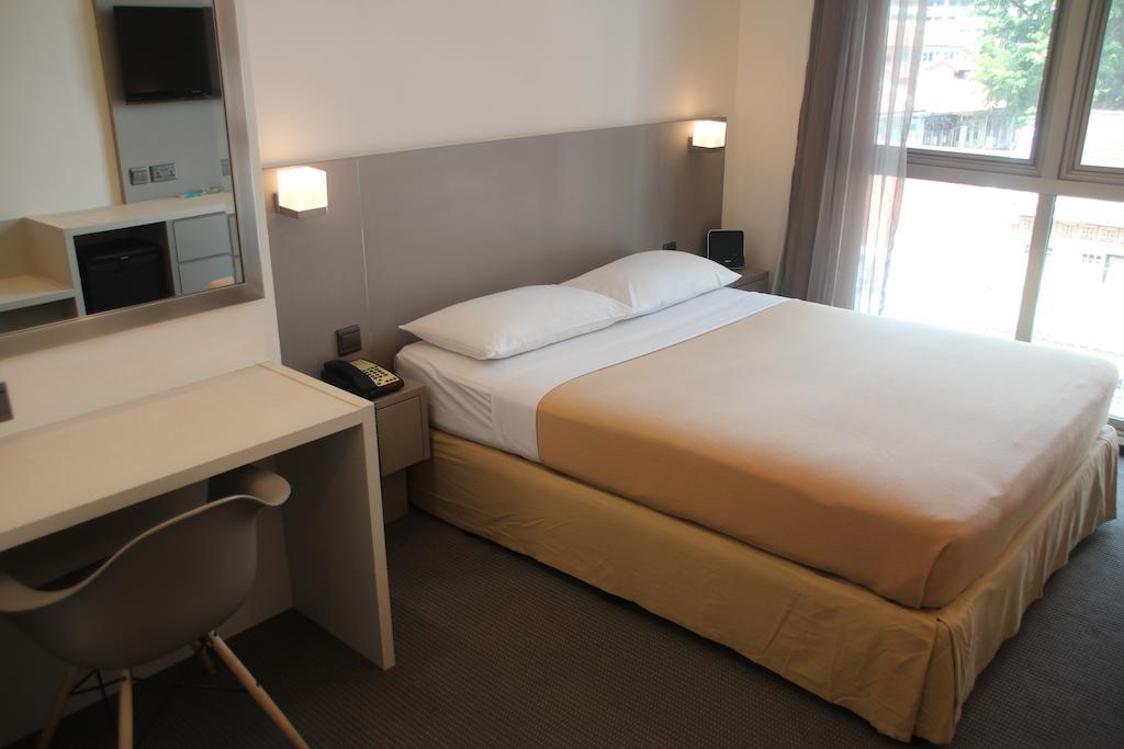 Classique Hotel Сингапур Номер фото